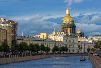 Buildings in city against sky