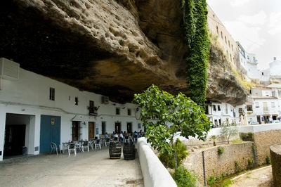 Footpath amidst buildings in town