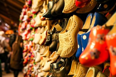 Full frame shot of various shoes for sale