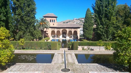 View of cemetery against clear blue sky