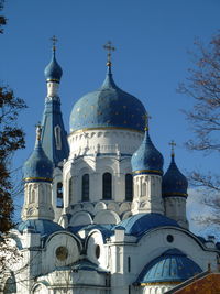 Low angle view of building against blue sky