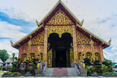 Entrance of historic building against sky