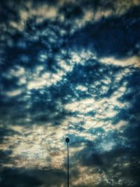 Street light against sky