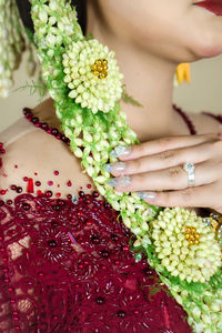 Beautiful model, wearing javanese indonesian wedding dress.