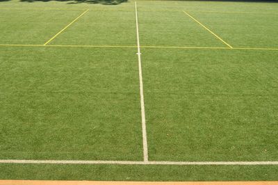 High angle view of soccer field during sunny day