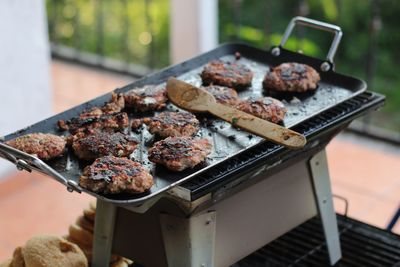 Close-up of meat on barbecue grill