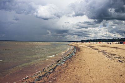 Scenic view of beach against sky