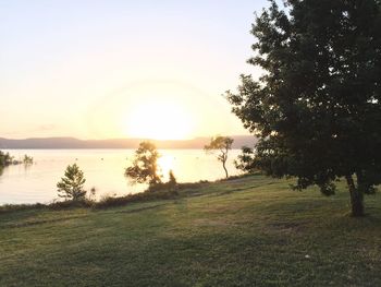 Scenic view of sunset over river