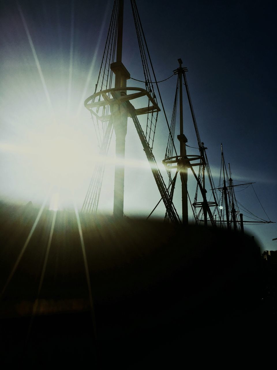 LOW ANGLE VIEW OF ELECTRICITY PYLON