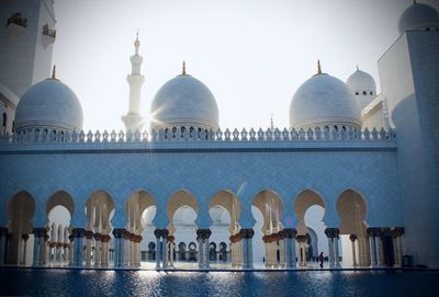 View of mosque against sky in city