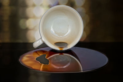 Close-up of coffee spilled on table