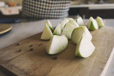 Close-up of sliced fruits on cutting board