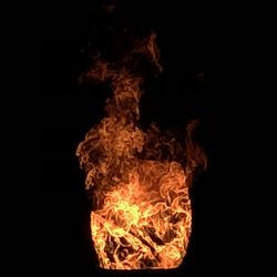 Close-up of bonfire against black background