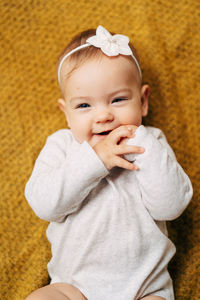 Close-up portrait of cute baby girl