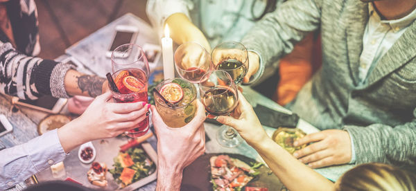 High angle view of people drinking glass