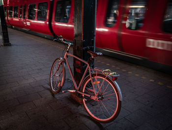 Bicycle parked at railroad station