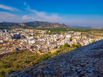 Aerial view of townscape against sky