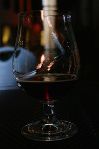 Close-up of wine glass on table