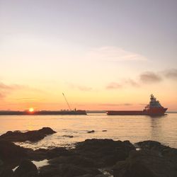 Scenic view of sea at sunset