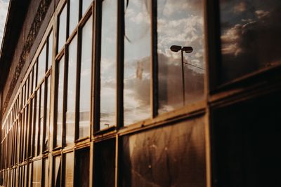 Close-up of window on building against sky