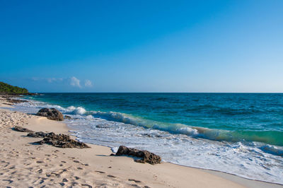 Scenic view of sea against clear sky