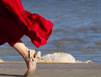 Low section of woman on beach