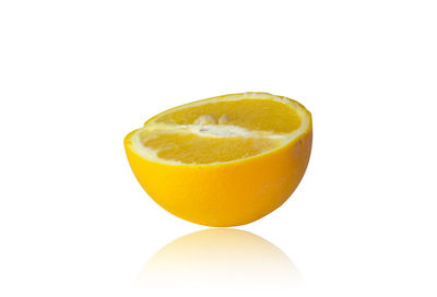 Close-up of oranges against white background