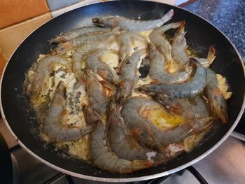 High angle view of fish in cooking pan