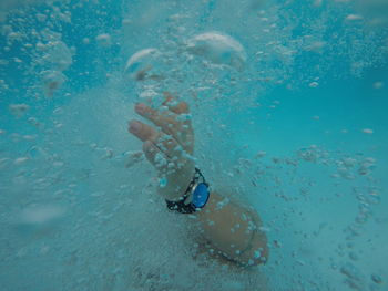 High angle view of person swimming in sea