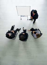 High angle view of people on floor