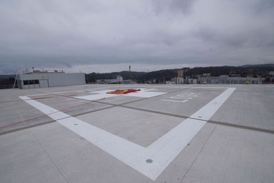 View of airport runway against sky