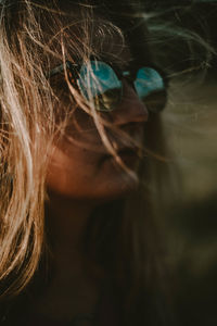 Close-up of woman wearing sunglasses