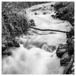 Close-up of water flowing through rocks