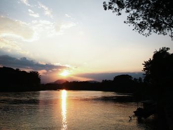 Scenic view of sunset over river