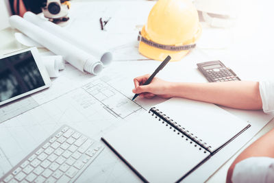 High angle view of person working on table