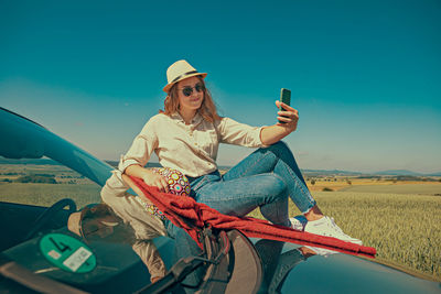 Young woman using mobile phone