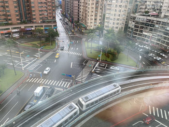 High angle view of illuminated city street at night