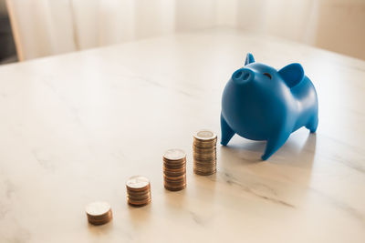 High angle view of coins on table