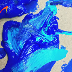 Full frame shot of blue painting on water