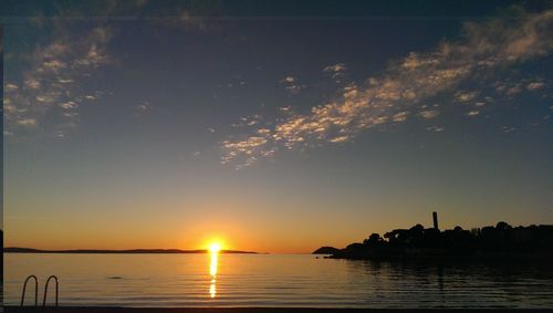 Scenic view of sunset over sea