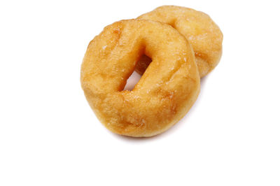 Close-up of bread on white background