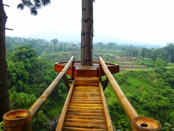 Bamboo bridge that connecting between another side to viewpoint of kedung kayang waterfall.