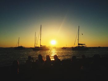 Silhouette of boat in sea