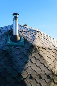 Low angle view of building against clear blue sky