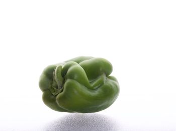 Close-up of bell peppers against white background