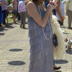 Midsection of woman standing on street