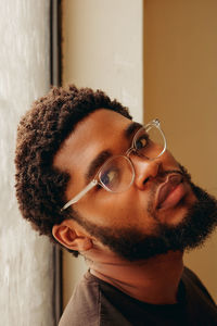 Portrait of young man looking away