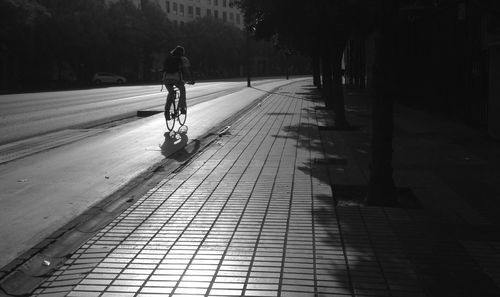 Woman walking on road