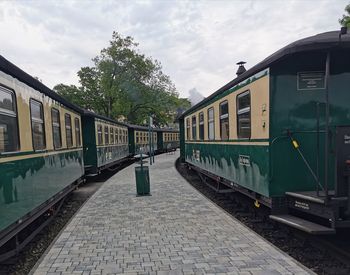 Train on railroad station platform against sky