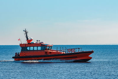 Ship in sea against sky